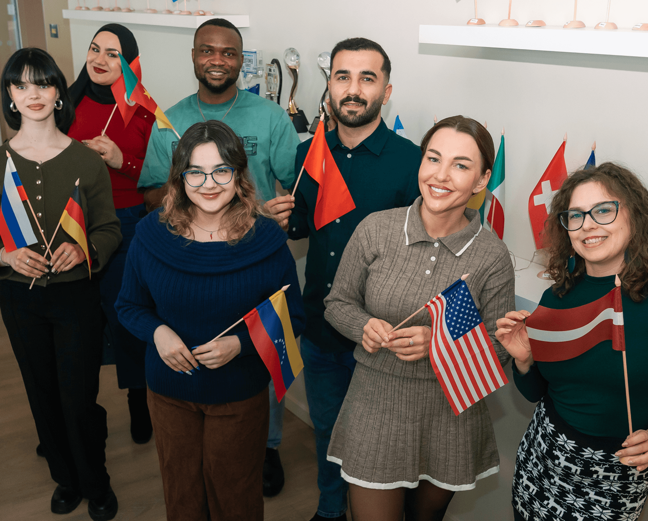 Team members holding flags