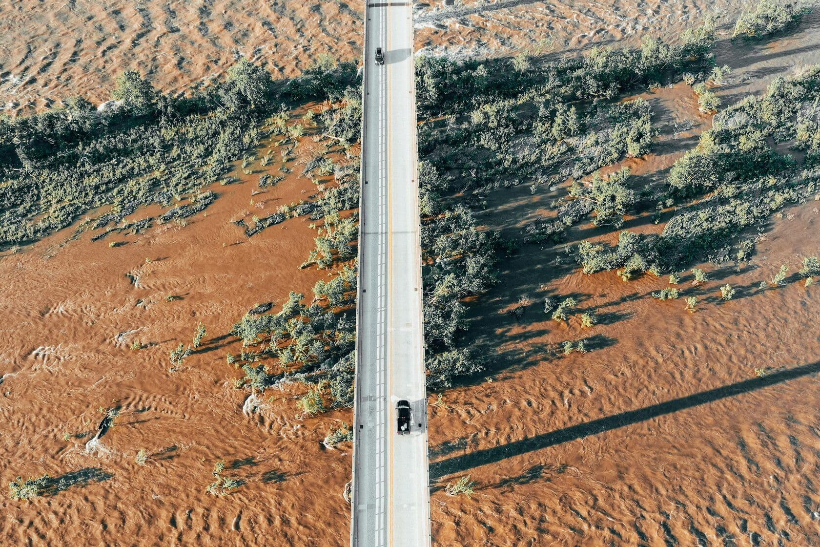 A bridge over a flooding river