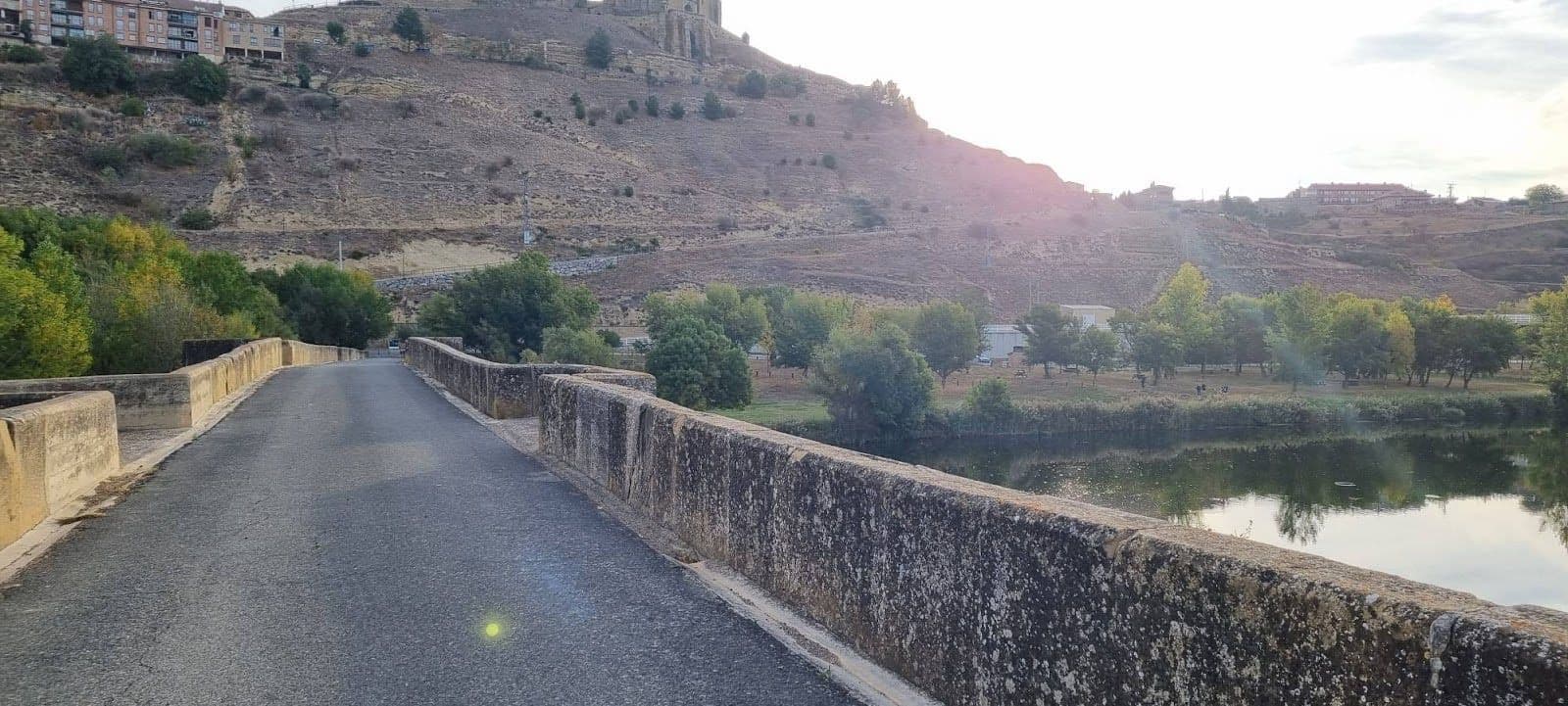 A driving point of view on a scenic bridge in rural Spain