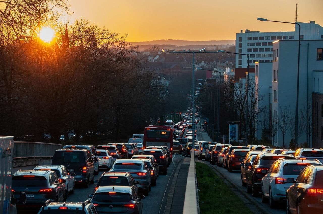 Evening traffic jam with a sunset in the background