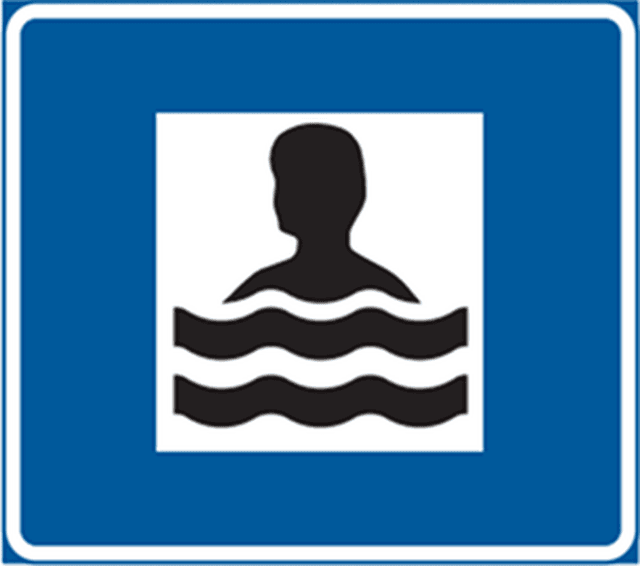 a road sign indicating a public swimming area in Sweden