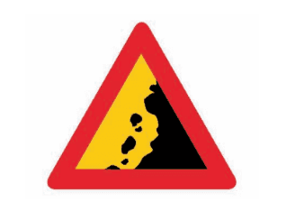 falling rock road sign in Greece