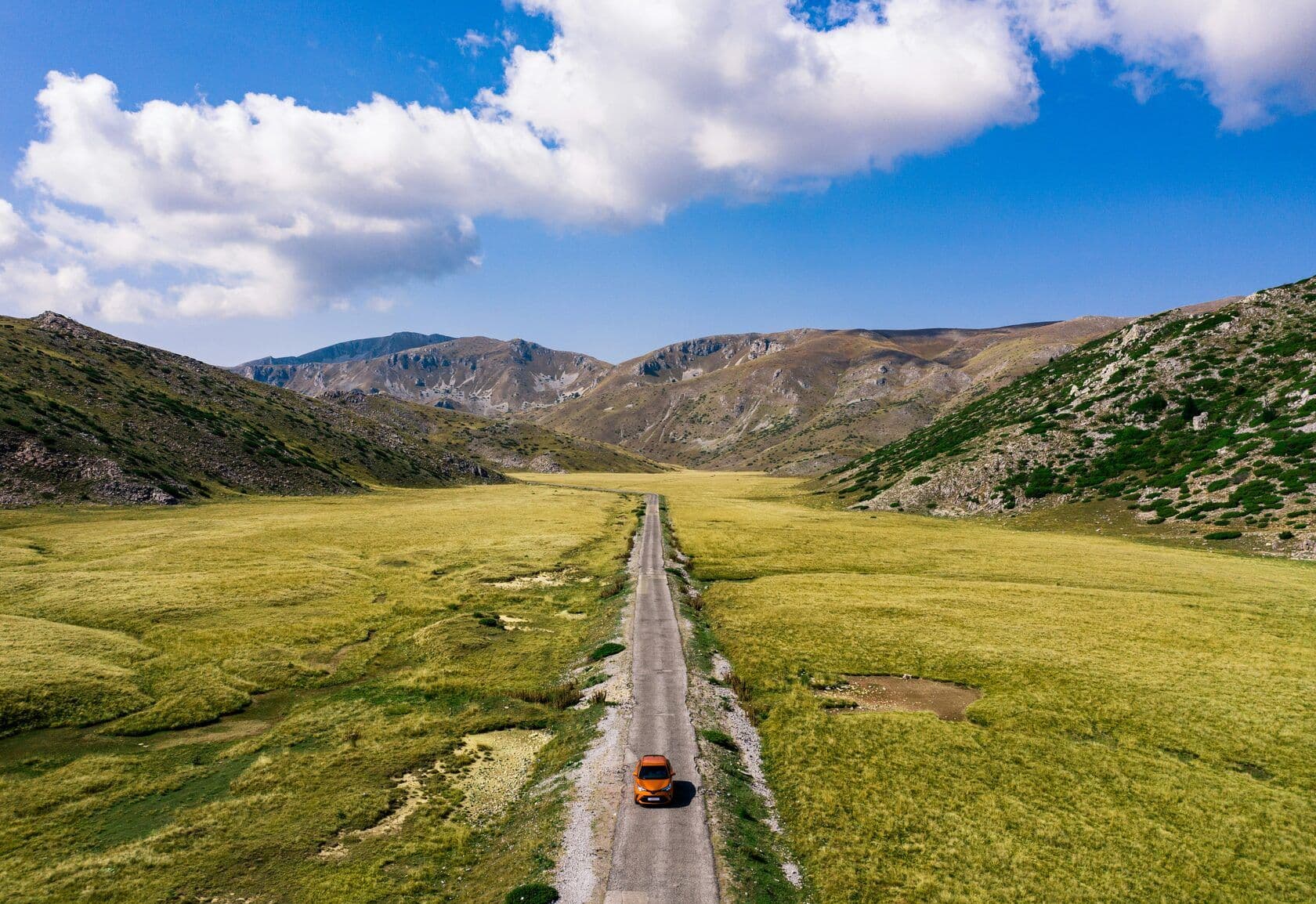 A car on the road in North Macedonia on a summer vacation day