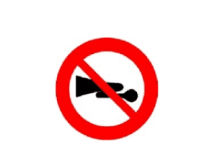 a no honking road sign in Spain